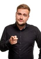 I choose you and order. The smiling business man point you, want you, half length closeup portrait on white studio background. photo