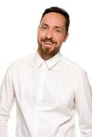 Stylish bearded business man smiling to camera, having pleased expression and cheerful look. photo