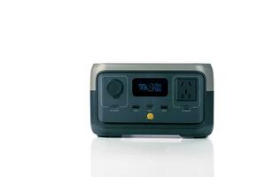 Portable power station or power box isolated on white background. On-the-Go energy solution. Power supply for outdoor adventure. Compact portable power box with a rechargeable lithium-ion battery. photo