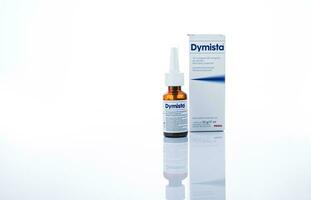 CHONBURI, THAILAND-DECEMBER 10, 2023 Dymista Nasal Spray isolated on white. Azelastine and fluticasone for treatment allergic rhinitis and rhino-conjunctivitis. Antihistamine and steroid nasal spray. photo