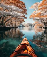 ai generado un atractivamente decorado kayac es flotante pasado nieve cubierto arboles en un lago foto