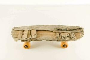 un patineta hecho fuera de antiguo madera foto