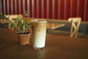 iced late in a transparent glass on cafe table outdoor photo