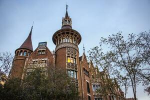 Historical facade of Casa de les Punxes in Barcelona. View of Casa Terradas modernist building photo