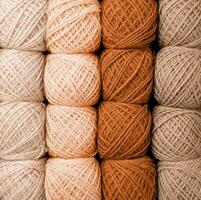 Knitting background, a lot of balls. Knitting yarn for handmade winter clothes photo