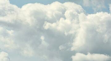 background photo of a cloudy sky during the day