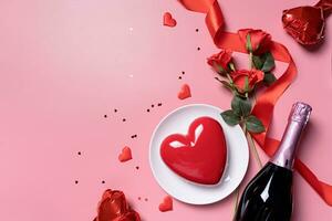 heart shaped glazed valentine cake and flowers on pink background photo