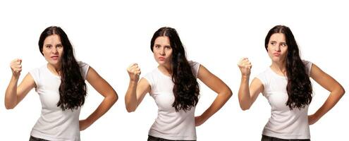 Beautiful woman in a light casual t-shirt posing isolated on white studio background. photo