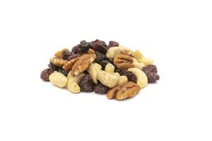 A handful of nuts and raisins, isolated on a white background. Nuts are so called because they all have one characteristic in common, they have less than 50 percent water photo