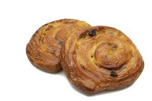 Swirl cake with raisins. Called in Spanish, Caracola. Isolated on white background. photo