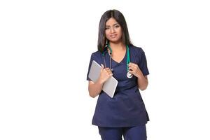 Portrait of young indian doctor woman with stethoscope around neck isolated on white background photo