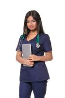 Portrait of young indian doctor woman with stethoscope around neck isolated on white background photo