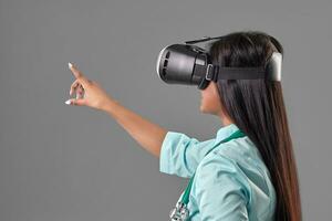 Young attractive doctor in a virtual reality glasses photo