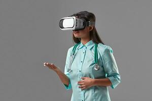 Young attractive doctor in a virtual reality glasses photo