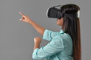 Young attractive doctor in a virtual reality glasses photo