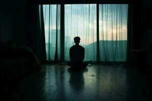 AI generated Bedroom solitude a lone man silhouette contemplates closed window curtains photo