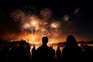 AI generated Night enchantment Silhouettes captivated by the magic of bursting fireworks photo