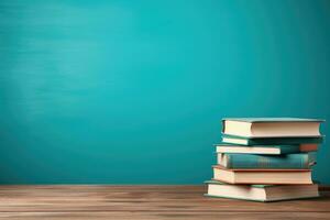 AI generated Stack of books and apple on wooden table. Back to school concept, Books on a wooden table with a teal background for back-to-school, AI Generated photo