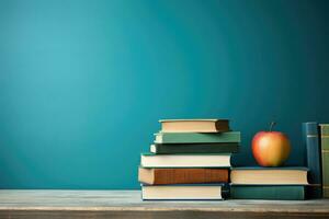 AI generated stack of books on wooden table and blue wall background, education concept, Books on a wooden table with a teal background for back-to-school, AI Generated photo