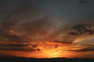 The warm and colorful illumination of the sky during sunset. photo