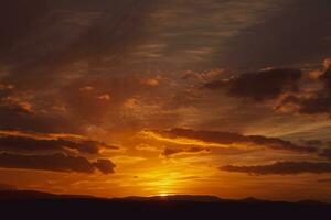 The warm and colorful illumination of the sky during sunset. photo