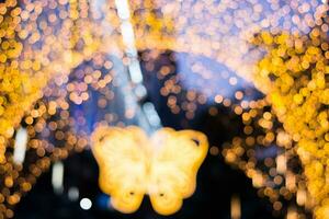 Abstract blure Bokeh lights and background decored in butterfly shape photo