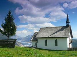 a white church with a steeple photo