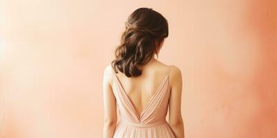 AI Generated Ai generation. Young woman in long dress on peach background. Back view. Fashion photo