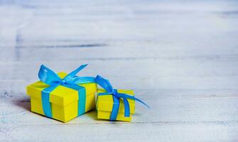 Gift boxes on wooden table. Collection of gift boxes on wooden board holidays concept. Presents for any holiday concept photo