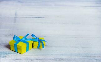 Gift boxes on wooden table. Collection of gift boxes on wooden board holidays concept. Presents for any holiday concept photo