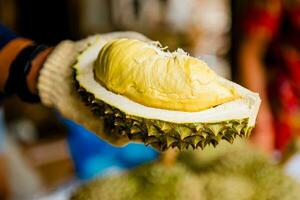 Durian king of fruit from Thailand Durian fruit durian peels, durian yellow meat, Tropical seasonal fruit. photo