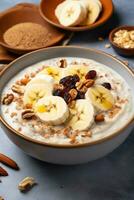 AI generated A bowl of creamy oatmeal with sliced banana, honey, and chopped walnuts photo