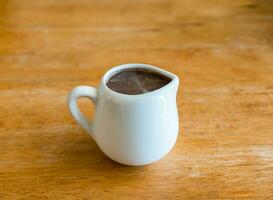 Chocolate cocoa hot drink in ceramic cup photo
