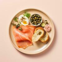 AI generated A plate of smoked salmon, cream cheese, and bagel with capers and red onion photo