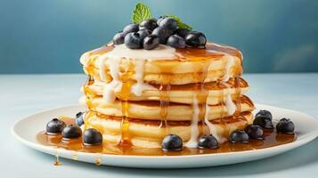 AI generated A stack pancakes topped with fresh blueberries and drizzled with syrup on background photo