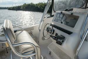 White yacht control panel with steering wheel photo