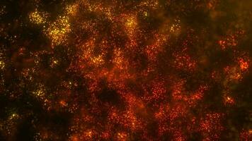 Animation of abstract glowing glitter particles. Flying bright dots and particles on an orange background. beautiful nebula made of dots. Seamless loop 4k video. Screensaver animation video