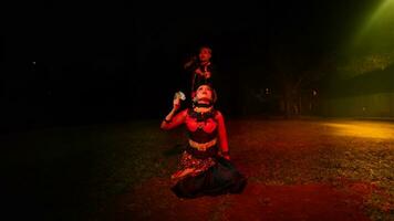 a female dancer looks lost and reflects the emptiness and loss photo