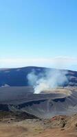 ai generado obtener arriba cerca y personal con un activo volcán como usted mirar abajo dentro sus latente cráter foto