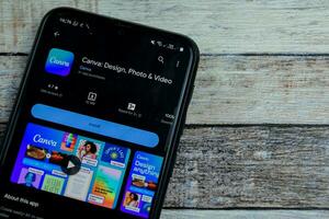 Canva application on Smartphone screen. Canva is a freeware web browser developed by canva. Bekasi, Indonesia, December 21, 2023 photo