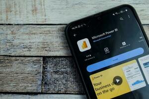 Power BI application on Smartphone screen. Power BI is a freeware web browser developed by Microsoft Corporation. Bekasi, Indonesia, December 21, 2023 photo