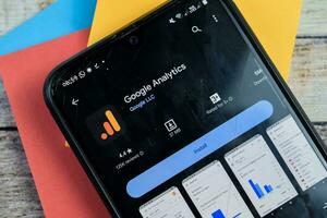 Google Analytics application on Smartphone screen. Google Analytics is a freeware web browser developed by Google LLC. Bekasi, Indonesia, December 18, 2023 photo