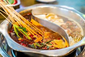 Original spicy hot pot at restaurant in Chengdu photo