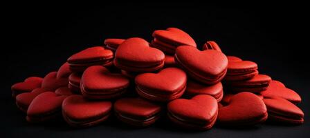 AI generated many red heart shaped cookies on a black background photo