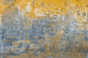 Background of old yellow painted wall texture photo