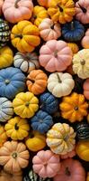 AI generated a group of colored pumpkins are sitting near each other photo