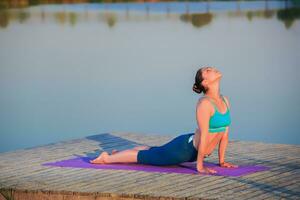 girl doing yoga exercise photo