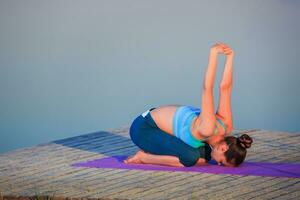 girl doing yoga exercise photo