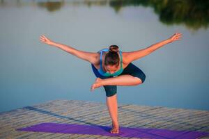 girl doing yoga exercise photo