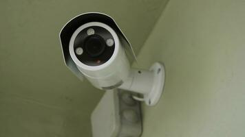 cctv installed on the wall to property security, indoor security. Indoor surveillance camera, closeup photo